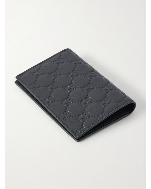 Arabella Logo-Debossed Leather Passport Case di Gucci in Black da Uomo