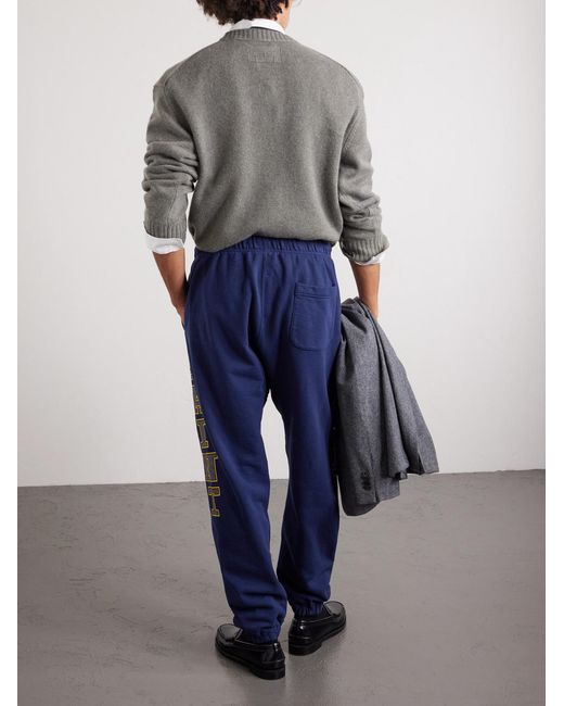 SAINT Mxxxxxx Blue Saint College Logo-print Cotton-jersey Sweatpants for men