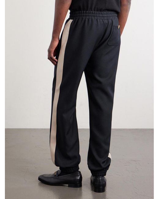 Valentino Garavani Blue Tapered Logo-appliqued Striped Drill Sweatpants for men