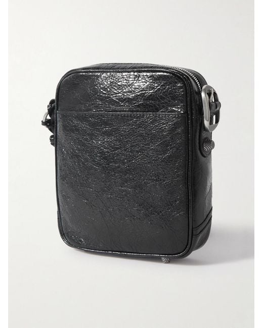 Balenciaga Black Le Cagole Embellished Textured-Leather Messenger Bag for men