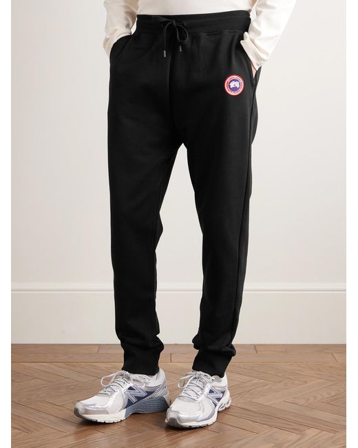 Canada Goose Black Huron Tapered Logo-Appliquéd Cotton-Jersey Sweatpants for men