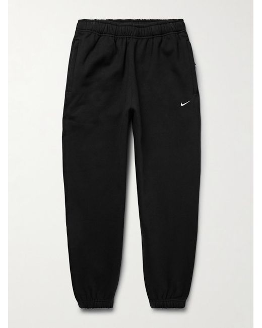Nike Solo Swoosh schmal zulaufende Jogginghose aus Jersey aus einer Baumwollmischung mit Logostickerei in Black für Herren