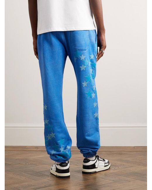 Amiri Blue Tapered Leather-Appliquéd Supima Cotton-Jersey Sweatpants for men