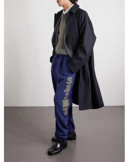 SAINT Mxxxxxx Blue Saint College Logo-print Cotton-jersey Sweatpants for men