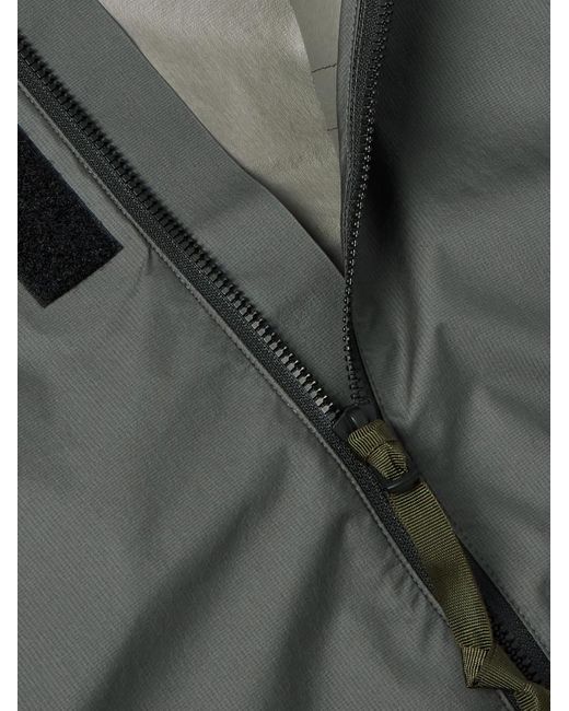 Giacca in GORE-TEX WINDSTOPPER® con borchie a punta J118-WS di Acronym in Black da Uomo