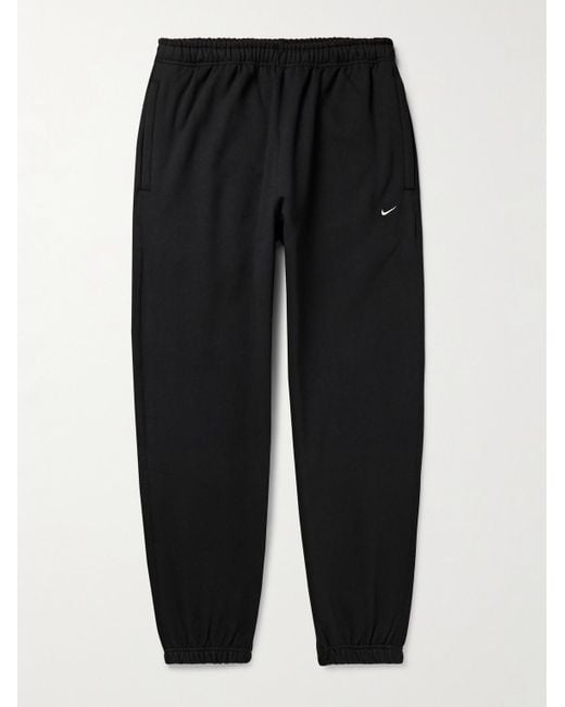 Nike Solo Swoosh schmal zulaufende Jogginghose aus Jersey aus einer Baumwollmischung mit Logostickerei in Black für Herren