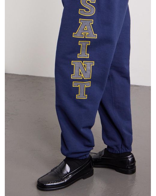 SAINT Mxxxxxx Blue Saint College Logo-print Cotton-jersey Sweatpants for men