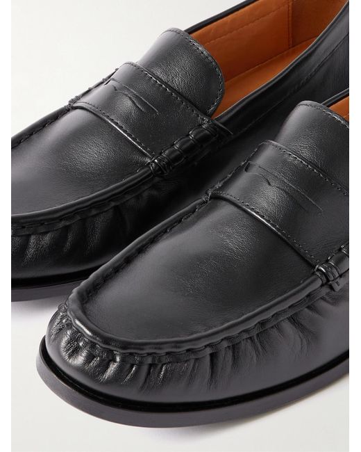 Mr P. Black Leather Penny Loafers for men