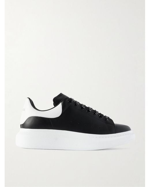 McQueen Black Exaggerated-Sole Studded Leather Sneakers for men
