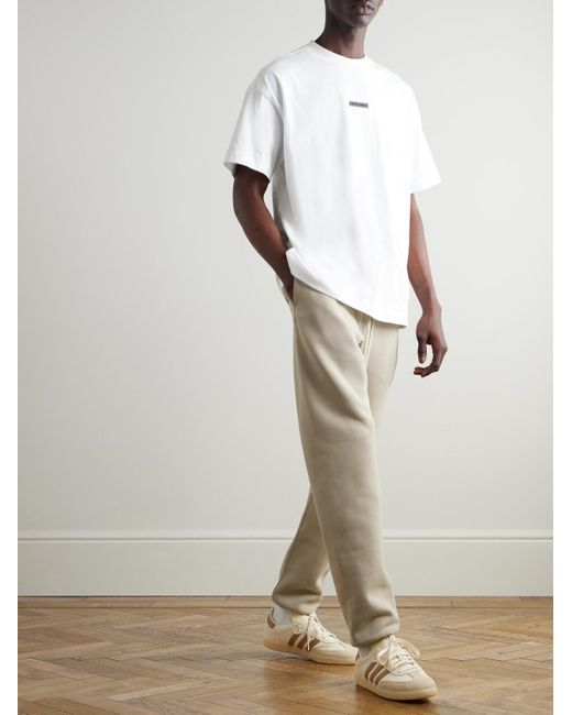 Fear Of God Schmal zulaufende Jogginghose aus Jersey aus einer Baumwollmischung mit Logoapplikation in Natural für Herren