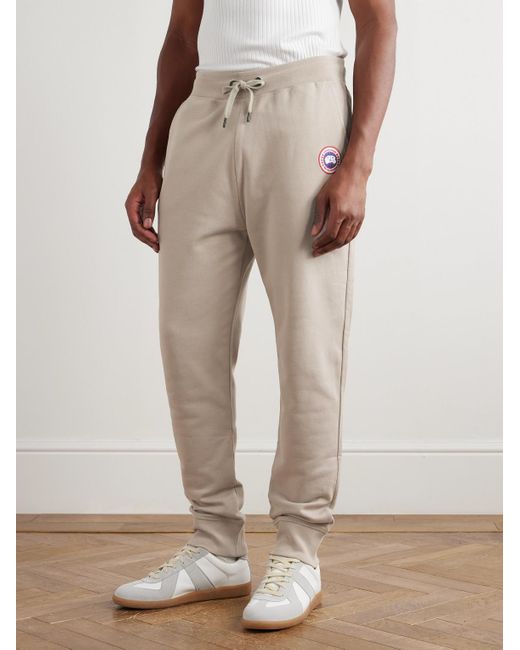 Canada Goose Natural Huron Tapered Logo-Appliquéd Cotton-Jersey Sweatpants for men