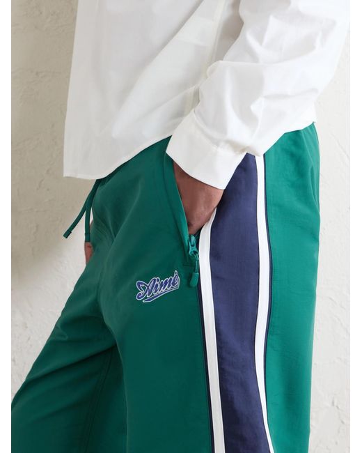 Aimé Leon Dore Green Logo-Embroidered Shell Track Pants for men