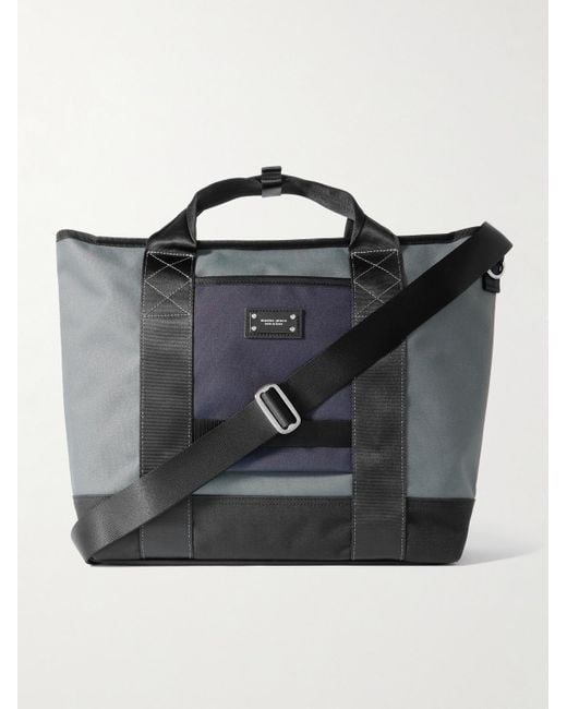 Defend 2-Way Leather-Trimmed Coated-Canvas Tote Bag di Master Piece in Black da Uomo