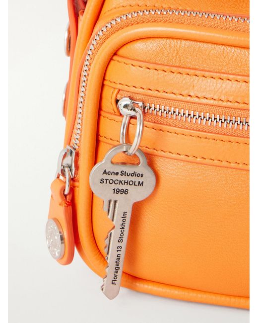 Camero Embellished Textured-Leather Messenger Bag di Acne in Orange da Uomo