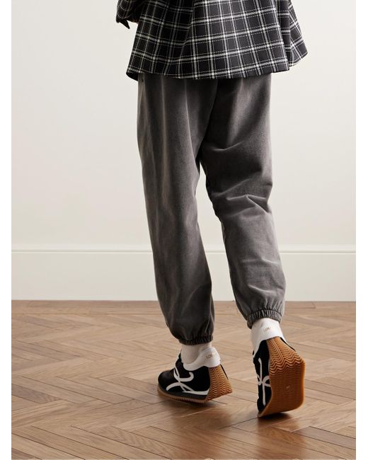 Pantaloni sportivi a gamba affusolata in jersey di cotone con logo applicato di Acne in Gray da Uomo