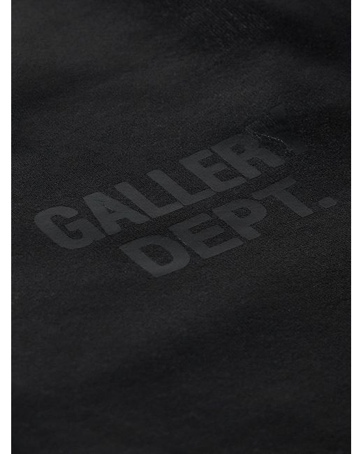 GALLERY DEPT. Black Analog Tapered Logo-Print Coated Cotton-Jersey Sweatpants for men