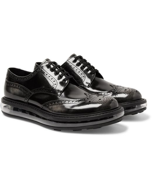 Prada Levitate Burnished-leather Wingtip Brogues in Black for Men | Lyst