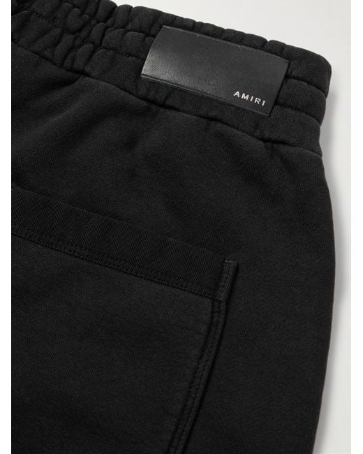 Amiri Black Wide-leg Logo-flocked Cotton-jersey Sweatpants for men