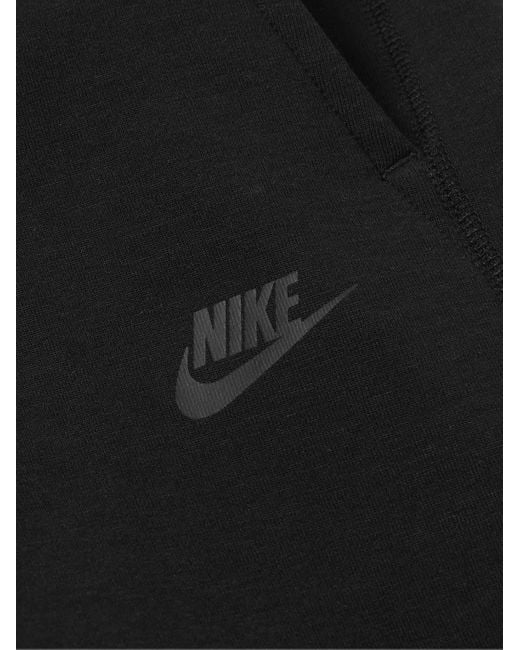 Nike Black Tapered Logo-print Cotton-blend Tech Fleece Sweatpants for men