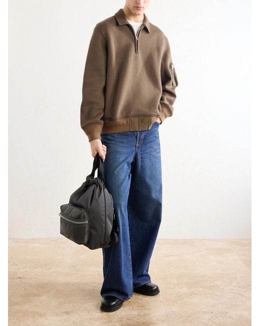 Sacai Black Logo-Appliquéd Shell Drawstring Backpack for men