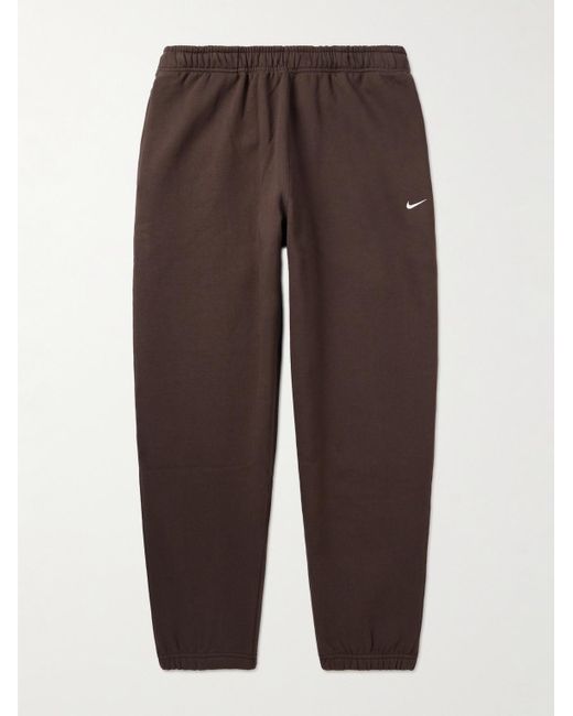 Nike - Solo Swoosh Tapered Logo-Embroidered Cotton-Blend Jersey Sweatpants  - Brown Nike
