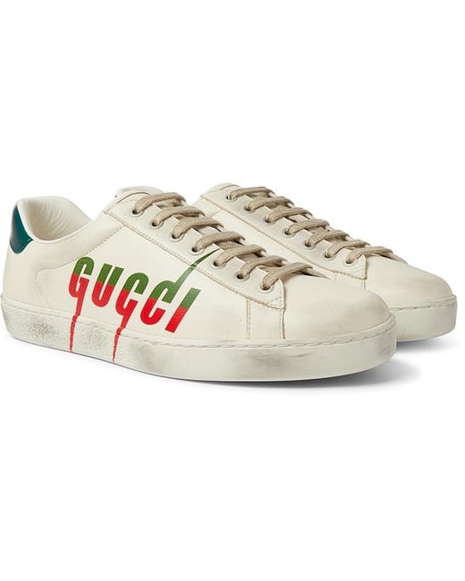 Gucci White Ace Distressed Leather Sneakers for men