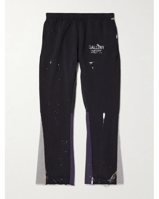 GALLERY DEPT. Blue Flared Paint-Splattered Panelled Logo-Print Cotton-Jersey Sweatpants for men