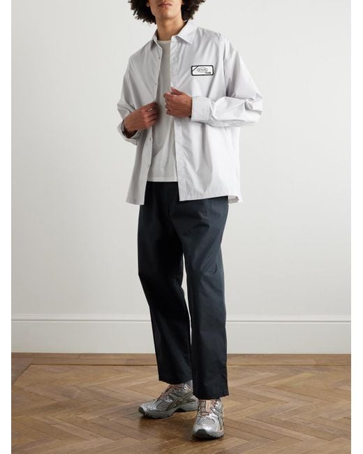 (w)taps Blue Tapered Cotton-Blend Drawstring Trousers for men
