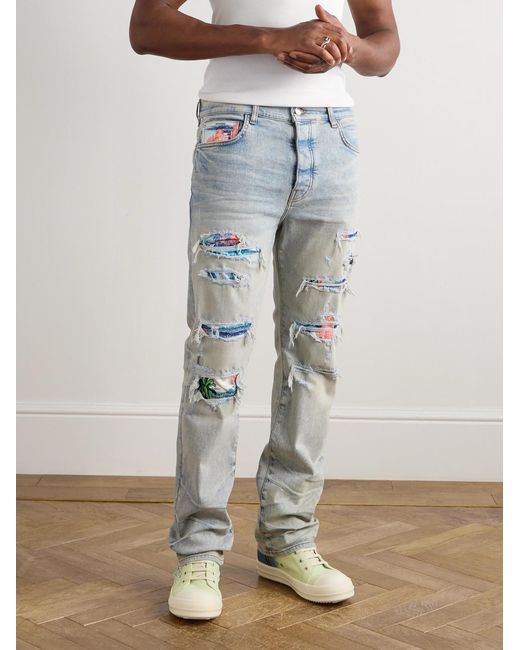 Amiri Blue Aloha Thrasher Skinny-Fit Distressed Embellished Panelled Jeans for men