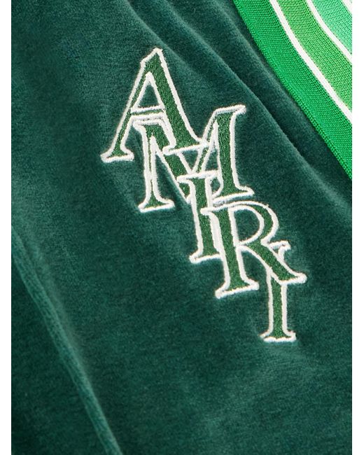Pantaloni sportivi a gamba dritta in velour di cotone con righe e logo ricamato di Amiri in Green da Uomo