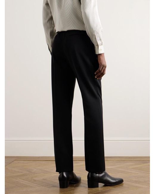 Pantaloni a gamba larga in lana grain de poudre con pinces di Saint Laurent in Black da Uomo