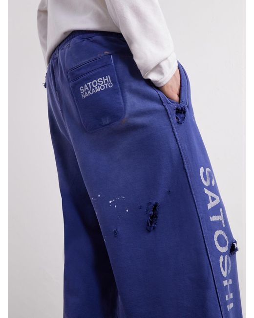 Satoshi Nakamoto Blue Luke Logo-Printed Paint-Splattered Distressed Cotton-Jersey Drawstring Sweatpants for men