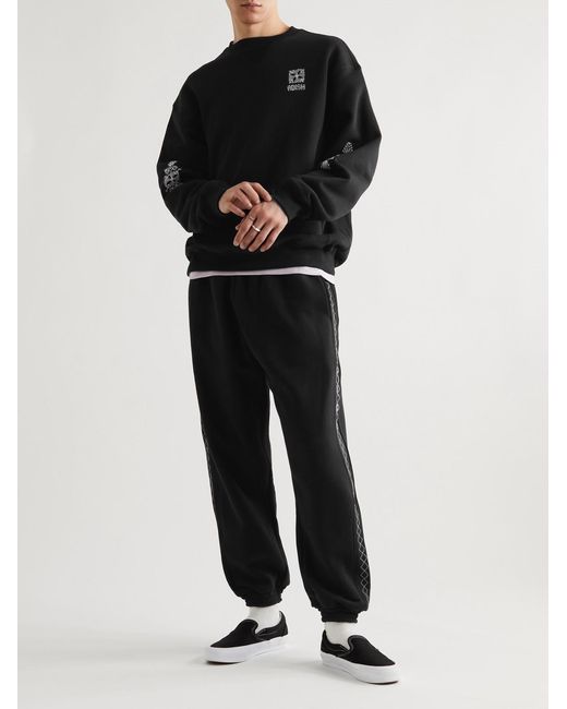 Adish Black Tapered Logo-embroidered Cotton-jersey Sweatpants for men