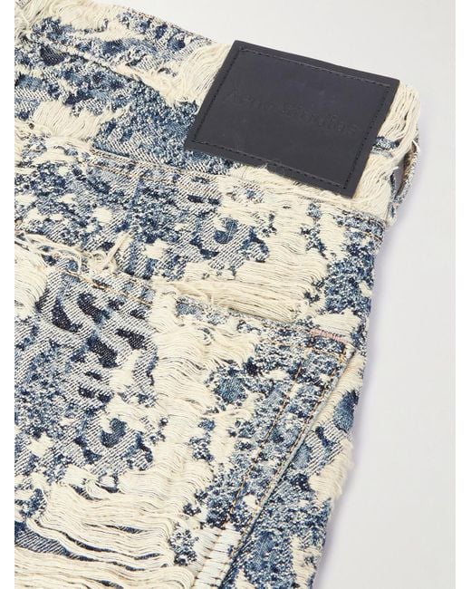 Jeans A Gamba Larga Effetto Consumato di Acne in Blue da Uomo