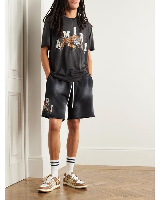 Amiri Black Wide-Leg Logo-Print Distressed Cotton-Jersey Drawstring Shorts for men