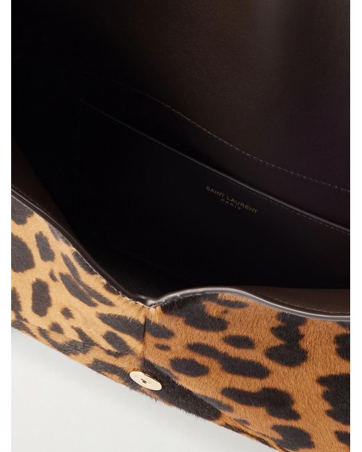 Logo-Appliquéd Leopard-Print Calf Hair Pouch di Saint Laurent in Metallic da Uomo