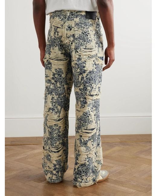 Jeans A Gamba Larga Effetto Consumato di Acne in Blue da Uomo