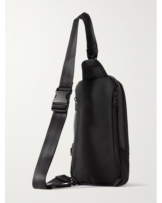 Master Piece Black Slick Logo-Appliquéd Leather And Cordura Barastec Nylon Sling Backpack for men