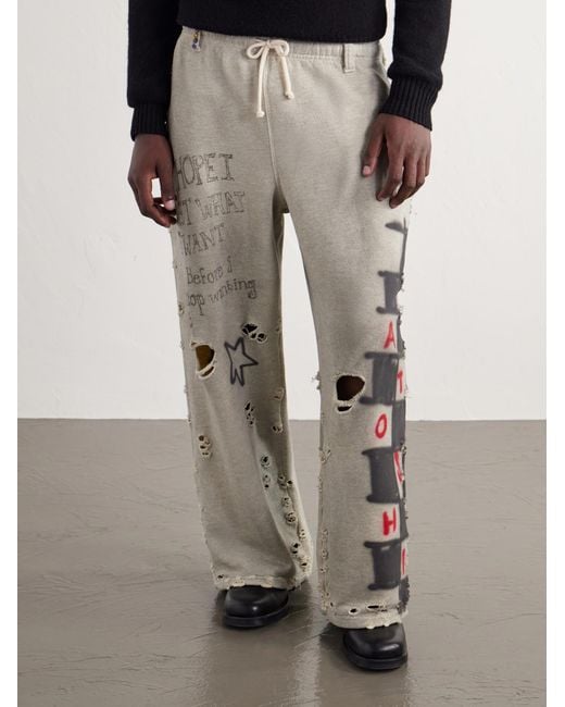 Satoshi Nakamoto White Get What I Want Printed Embellished Distressed Cotton-jersey Sweatpants for men