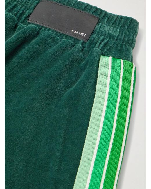 Pantaloni sportivi a gamba dritta in velour di cotone con righe e logo ricamato di Amiri in Green da Uomo
