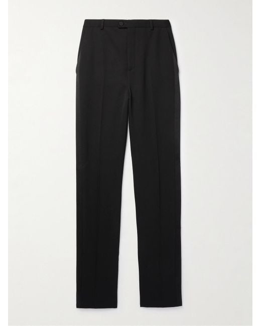 Pantaloni a gamba affusolata in lana grain de poudre con finiture in seta di Saint Laurent in Black da Uomo