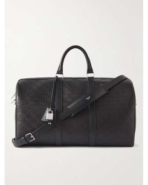 Medium Voyage Logo-Debossed Leather Holdall di Céline in Black da Uomo