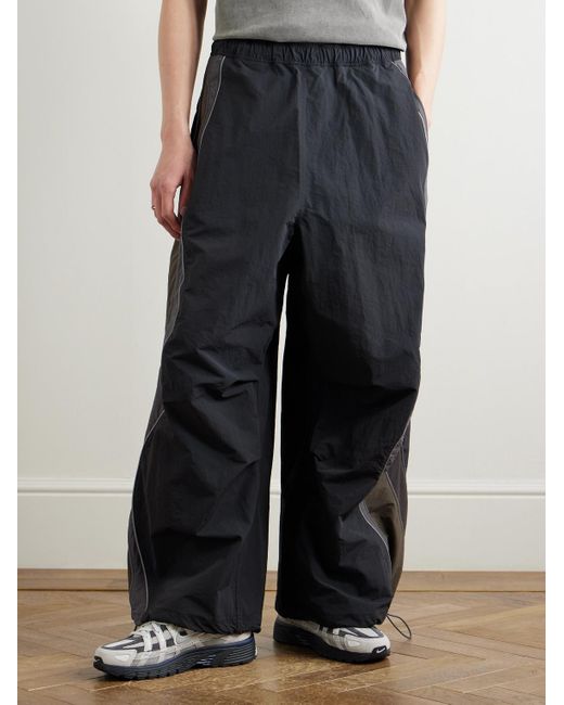 ERL Blue Ufo Wide-Leg Striped Shell Trousers for men