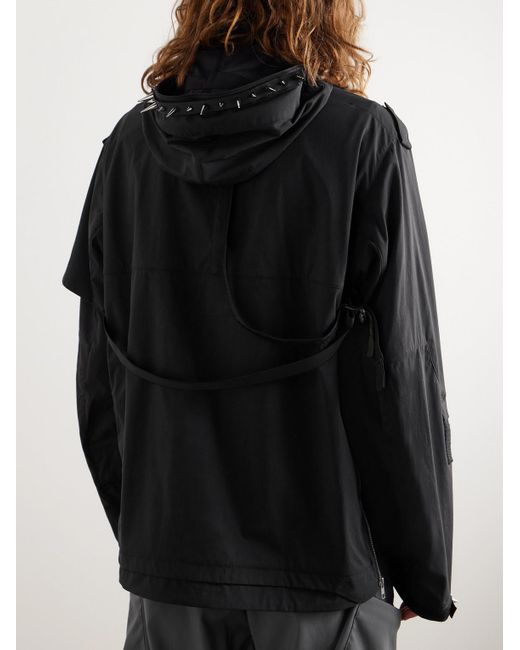 Giacca in misto nylon con cappuccio e borchie a punta J1WB-E di Acronym in Black da Uomo
