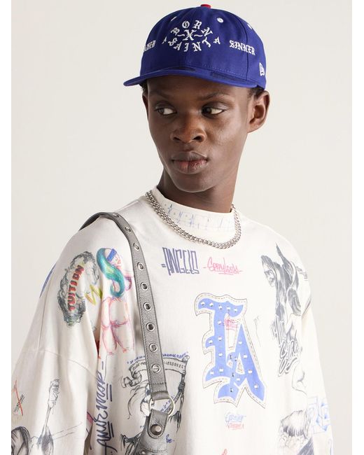 SAINT Mxxxxxx Blue Born X Raised New Era Embroidered Canvas Trucker Cap