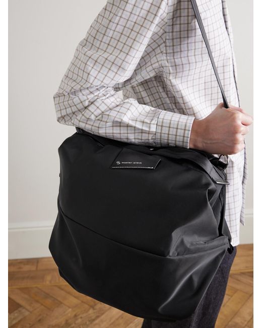 Cocoon Leather-Trimmed Recycled Nylon Weekend Bag di Master Piece in Black da Uomo