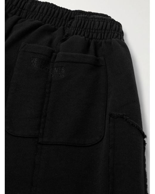 Pantaloni sportivi a gamba larga in jersey di misto cotone a pannelli di Vetements in Black da Uomo