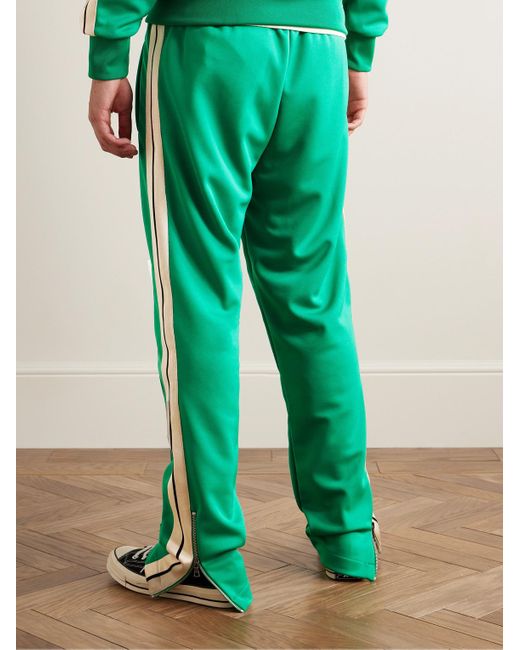 Pantaloni sportivi a gamba dritta in jersey tecnico con righe e pieghe di Palm Angels in Green da Uomo