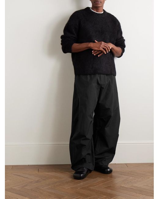 Pantaloni A Gamba Larga di Amomento in Black da Uomo