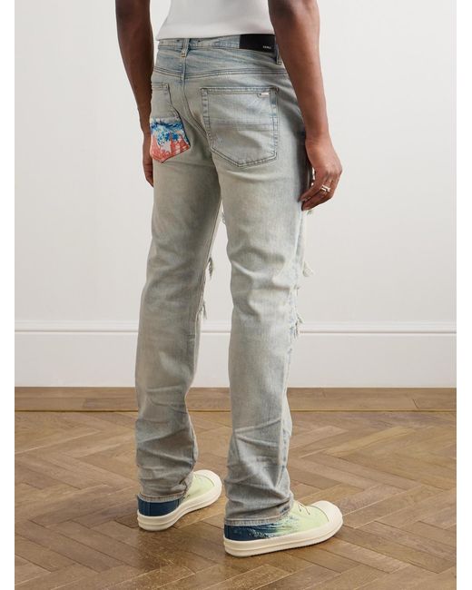 Amiri Blue Aloha Thrasher Skinny-Fit Distressed Embellished Panelled Jeans for men